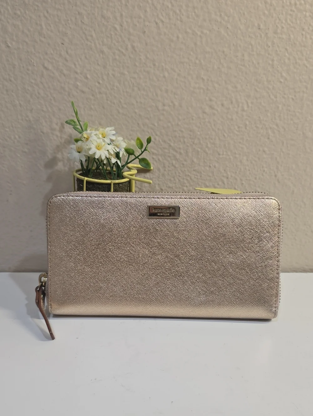 kate spade metallic rose gold zip-around continental wallet